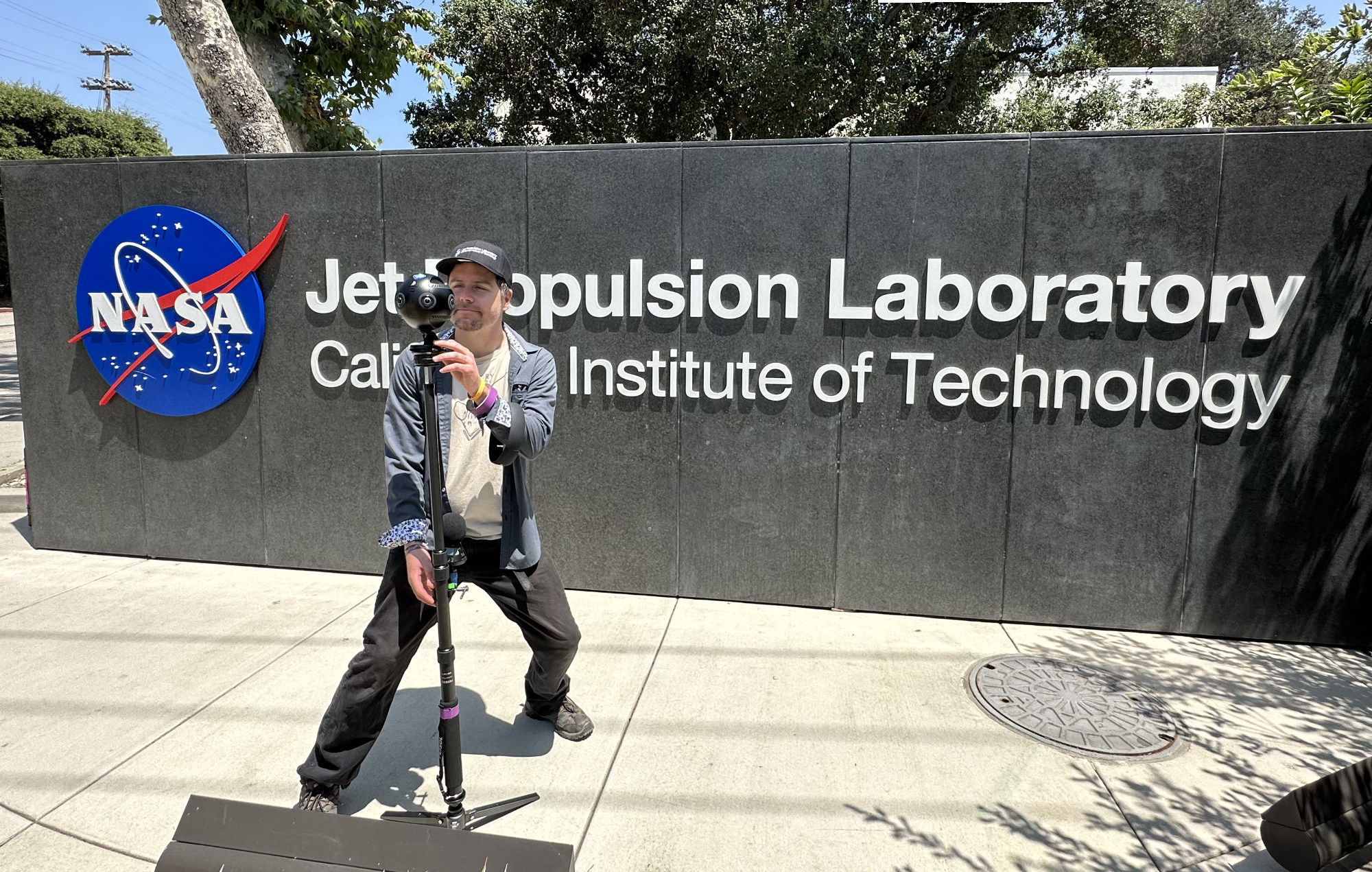 VR videographer with 360 camera at NASA Jet Propulsion Laboratory filming Immersive content