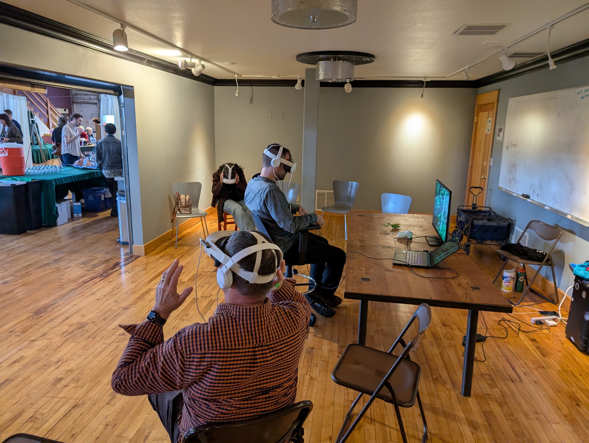 Attendees using VR headsets at Bark event fundraiser